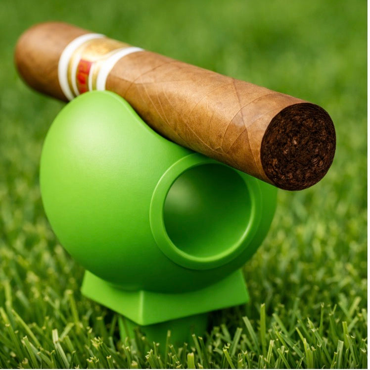 BogeyforStogies elevated cigar stand placed on grass, holding a cigar above the ground